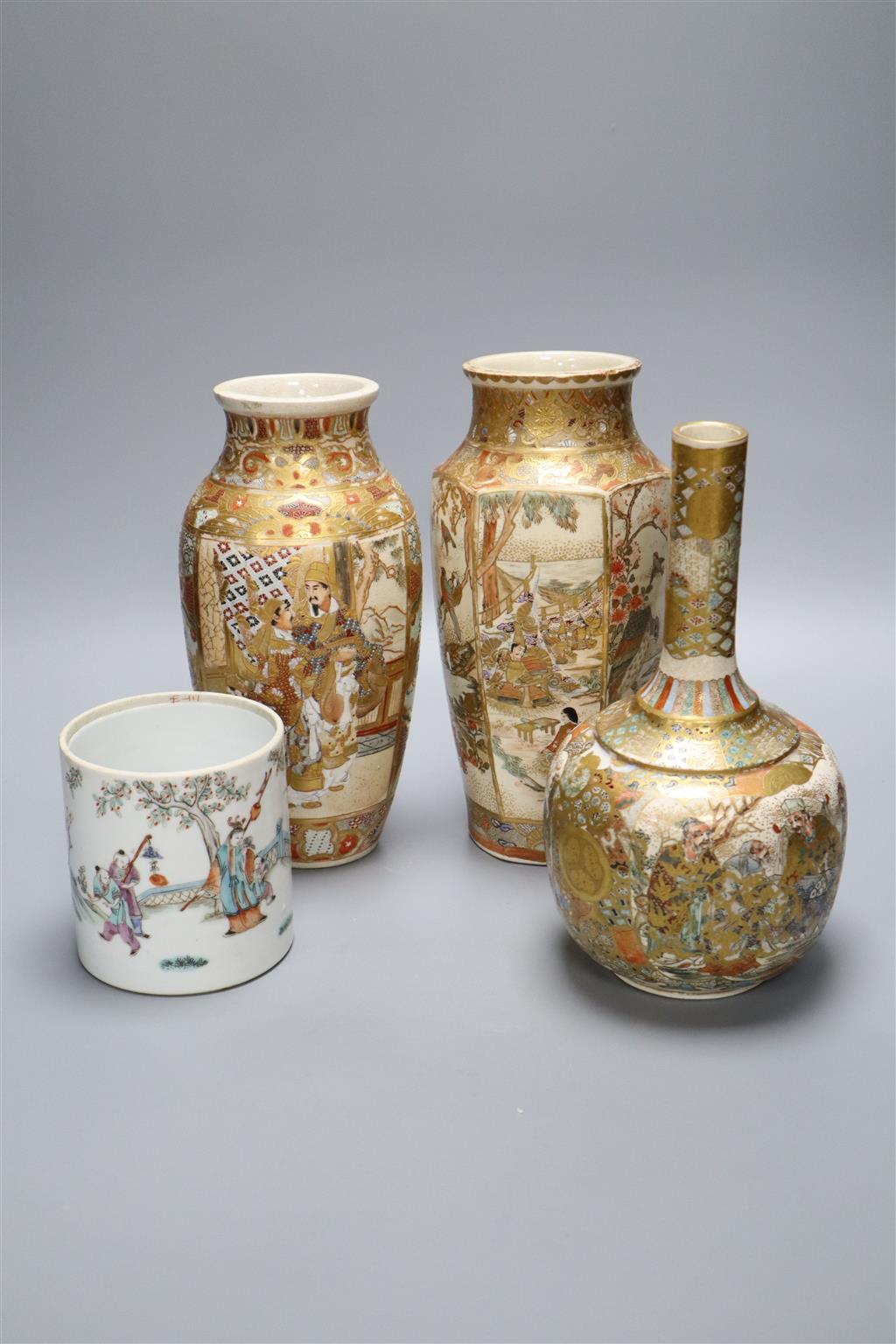 Three Japanese Satsuma vases and a Chinese jar, tallest 24cm